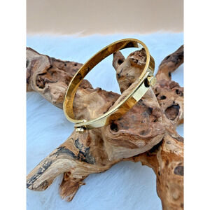 Vintage 1976 Aldo Cipullo for Charles Revson Gold Tone Bangle Bracelet